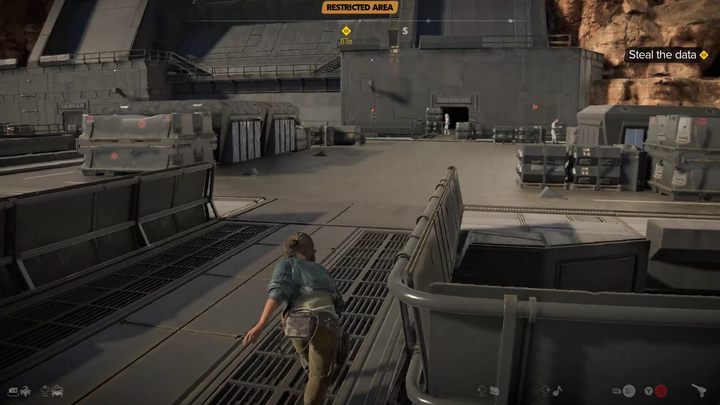 Idźcie po murze i przy pierwszej okazji skręćcie w prawo, przechodząc po kładce na lądowisko - Star Wars Outlaws: Przysługa dla Jabby - solucja, opis przejścia - Star Wars Outlaws - poradnik do gry
