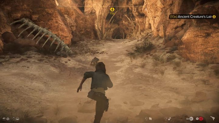 Jaskinię rozpoznacie po kościach rozrzuconych wokół wejścia do niej - Star Wars Outlaws: Strzelec - solucja, opis przejścia - Star Wars Outlaws - poradnik do gry