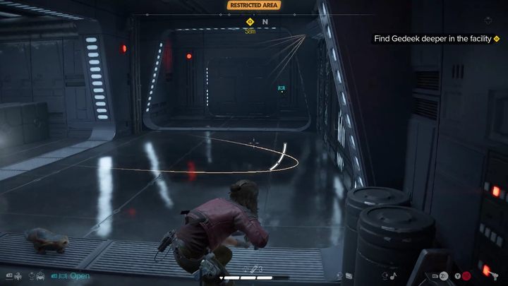 Idźcie prosto - musicie uniknąć kolejnej kamery oraz dwóch szturmowców po lewej - Star Wars Outlaws: Inżynier droidów - solucja, opis przejścia - Star Wars Outlaws - poradnik do gry