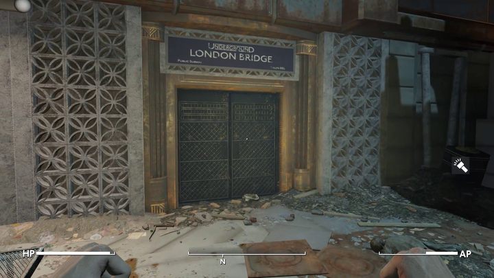 Stojąc obok fontanny zwróćcie się w stronę oświetlonego symbolu - Fallout London: Broken Angel - Fallout London - poradnik do gry