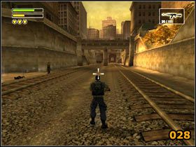 Zejdź na dół i skieruj się w stronę budynku z filarami (027) ; po jego lewej stronie są schody prowadzące na tory - Fire Station | Solucja | Freedom Fighters - Freedom Fighters - poradnik do gry