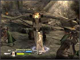 Na dole musisz wystrzelić z trzech dział do pomostu, po którym przechodzą antagoniści do wrót twierdzy - Helm's Deep - Droga Gandalfa Białego - Władca Pierścieni: Powrót Króla - poradnik do gry