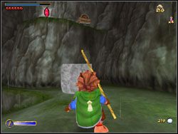 Teraz przesuń szary głaz tak, abyś mógł wskoczyć na platformę z czerwoną skrzynią - 04 - Over Hill and Under Hill cz.1 | The Hobbit - The Hobbit - poradnik do gry