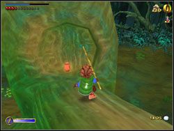 Jak już ją weźmiesz, wróć i przemieść się tratwą (w międzyczasie możesz zapisać grę) na mały skrawek terenu położony przy skale - 06 - Flies and Spiders cz.2 | The Hobbit - The Hobbit - poradnik do gry