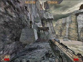 Najlepszym sposobem dotarcia do niej jest wspięcie się po skale na półkę przed nami (widoczną na obrazku) - 6.9 Jaskinia cz.9 | Painkiller Battle Out of Hell - Painkiller: Battle Out of Hell - poradnik do gry