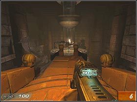 Mniej więcej w połowie drogi, po lewej stronie znajduje się półka skalna, a na niej zbroja (#5) - Erebus - Level 1 | Doom 3 Resurrection of Evil - Doom 3: Resurrection of Evil - poradnik do gry