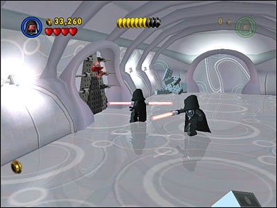 W korytarzu, w którym zamykałeś tunele, przez które wlatywały roboty, użyj Sitha do otwarcia czarnych drzwi po lewej - [E2] Chapter 1 - Kanistry 8-10 - LEGO Star Wars - poradnik do gry