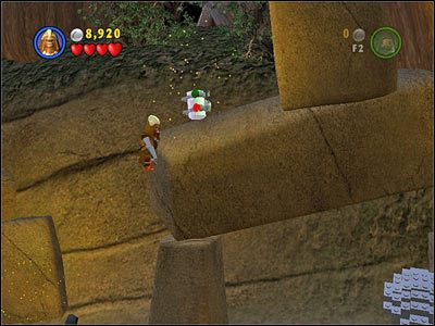 Użyj haka w punkcie na pochylni, z której spadają głazy - [E3] Chapter 4 - Kanistry 8-10 - LEGO Star Wars - poradnik do gry