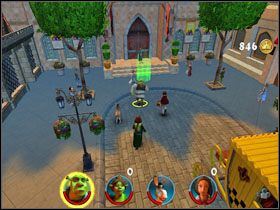 Przechodzimy na drugą stronę i zbieramy następną fasolkę [5/12] znad znajdującej się tam złotej karety - [Solucja] Etap 3 - Zasiedmiogród cz.1 | Shrek 2 Team Action - Shrek 2: Team Action - poradnik do gry