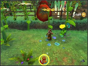Przeskakujemy przez pierwszą serię kwiatków (na tych bocznych znajdujemy trochę złota) i chowamy się w pobliskiej zagrodzie - [Solucja] Etap 6 - Farma Jacka i Jilla cz.2 | Shrek 2 Team Action - Shrek 2: Team Action - poradnik do gry