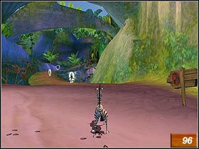 Wróć się w okolice początkowego totemu i znajdź jaskinię, do której prowadzi drogowskaz z wizerunkiem zebry (#96) - Back to the Beach | Solucja Madagaskar - Madagaskar - poradnik do gry