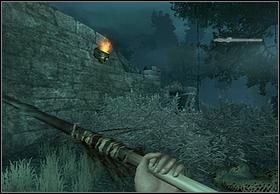 Gdy zagrożenie minie rzuć jedną z dzid w zbiornik z ogniem zawieszony nad krzakami blokującymi Ci drogę - [Solucja] Heading Back | Peter Jacksons King Kong - Peter Jacksons King Kong - poradnik do gry