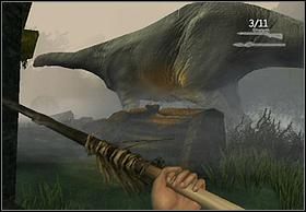 Przechodzić będziesz koło podwyższenia, na którym znajduje się źródło ognia, podnieś dzidę która leży koło miejsca, gdzie stoi bohater na zdjęciu i odpal ją - [Solucja] The Canyon cz.2 | Peter Jacksons King Kong - Peter Jacksons King Kong - poradnik do gry