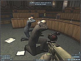 Skieruj się do wybranej wcześniej zasłony i zacznij strzelać do pojawiających się terrorystów - [Misja 05] [Segment 2/2] Parliament | Rainbow Six Lockdown - Tom Clancys Rainbow Six: Lockdown - poradnik do gry