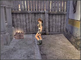 Po przeskoczeniu z flagi na niewielki balkonik wyważ znajdujące się obok drzwi (#1) - Etap 2 Peru - Return to Paraiso (1) | Sekrety | Tomb Raider Legenda - Tomb Raider: Legenda - poradnik do gry