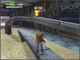 T - Przed wyjazdem z centrum, na pochyłej brarierce - The Mall | Classic mode | Tony Hawks American Wasteland - Tony Hawks American Wasteland - poradnik do gry