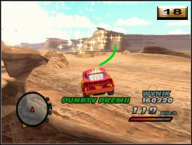 Pruj naprzód główną drogą mijając łuk skalny i zataczając małe koło w sąsiedztwie barierek - [Minigry] Pościg za Pocztówkami Gieni - Chłodnica Górska cz.2 | Auta - Auta - poradnik do gry