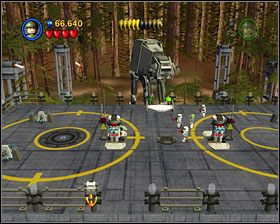 Używając dwu dźwigni po bokach drzwi wejdź do konstrukcji - Episode VI - Speeder Showdown | Story Mode LEGO Star Wars II - LEGO Star Wars II: The Original Trilogy - poradnik do gry