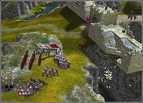 Stąd możesz zniszczyć cały mur po prawej stronie zamku - Chapter VIII - The Fall of the Round Table | Kampania King Arthur - Twierdza Legendy - poradnik do gry