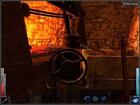 Kołowrotem kokil umieszczamy nad żarzącym się paleniskiem. - Dead Mans Trail (5) | Rozdział 3 | Dark Messiah of Might and Magic - Dark Messiah of Might and Magic - poradnik do gry