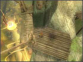 Nim udasz się w górę wzniesienia, skręć w lewo na drewnianą platformę i zeskocz z niej na kładkę - [ETAP III] Betameche in danger cz.4 | Artur i Minimki - Artur i Minimki - poradnik do gry