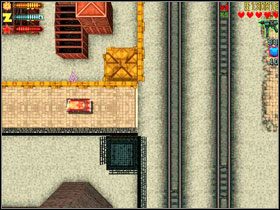 Gdy dojedziesz do stacji, przejdź mostkiem #1 na teren ruskich, gdzie znajdziesz ciężarówkę #2 - Zaibatsu (3) | Industrial | GTA 2 - GTA 2 - poradnik do gry