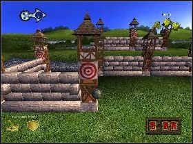 Na początku wybierz machinę oblężniczą, z której ostrzelasz zamek - [Solucja] Etap 8 - Zdobycie zamku Lancelota | Shrek Trzeci - Shrek Trzeci - poradnik do gry