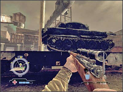 Drugi czołg znajduje się po prawej stronie, a konkretnie przy wielkiej bramie prowadzącej do zabezpieczonego już magazynu - Destroy Tanks on Railcars (cz.3) | Operation Varsity w Medal of Honor Airborne - Medal of Honor: Airborne - poradnik do gry
