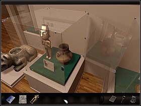 A zatem musisz wstawić do gabloty coś, czego ciężar zasugeruje czujnikom, że figurka jest z powrotem na miejscu - Muzeum Sztuki Prekolumbijskiej (4)| Dzień 2 | Art of Murder Sztuka Zbrodni - Art of Murder: Sztuka Zbrodni - poradnik do gry