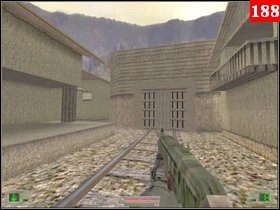 Skręć w prawo i przejdź przez drzwi po lewej (za drzwiami po prawej jest amunicja do bazooki, na stole C4 i granaty), idź korytarzem, który prowadzi na wprost - Misja 07 - Sudan (1) | Opis przejścia Soldier of Fortune - Soldier of Fortune - poradnik do gry