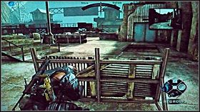 Idź cały czas przed siebie, aż zobaczysz zbiornik z paliwem umieszczony za kratami - China | Misje | Army of Two - Army of Two - poradnik do gry