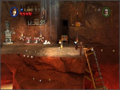 Idź na lewą stronę i używając bicza, przeskocz nad przepaścią - Chapter 3 - The Temple of Kali (cz.1) - Świątynia Zagłady - LEGO Indiana Jones: The Original Adventures - poradnik do gry