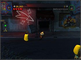 Wysadzisz nim kraty na dole oraz ciężarówkę blokującą wejście do budynku - In the Dark Night (cz.2) | Heros Episode 3 | LEGO Batman The Videogame - LEGO Batman: The Videogame - poradnik do gry