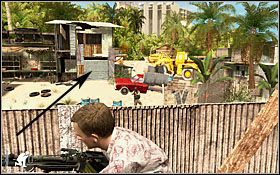 Strzałka wskazuje szopę, z której wybiegną wrogowie podczas ostatniego ataku oraz położenie zbiornika z paliwem - Etap V - Shanty Town | Quantum of Solace - Quantum of Solace - poradnik do gry