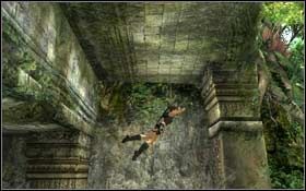 Wykonaj skok do tyłu, aby złapać się krawędzi biegnącej wzdłuż fasady budynku - Coastal Thailand - Remnants (cz.1) | Solucja Tomb Raider Underworld - Tomb Raider: Underworld - poradnik do gry
