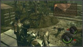 Po rozprawieniu się z czworonogami, wchodzimy na drewniane palety, znajdujące się po lewej stronie - Train Station (2-2) | Opis przejścia Resident Evil 5 - Resident Evil 5 - poradnik do gry