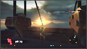 Zeskocz trochę na dół i zbliż się do krawędzi, a będziesz mógł zobaczyć zawieszony w powietrzu drugi bonus - Rozdział 1 - The Constructor - BOSS | Akt 3 Bionic Commando - Bionic Commando - poradnik do gry