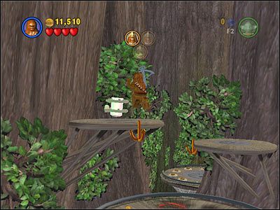 Użyj haka w miejscu na platformie znajdującej się tuż obok miejsca, w którym uratowałeś drugiego Wookiego - Chapter 4 - Defense of Kashyyyk - Free Play - Episode 3 - LEGO Star Wars: The Complete Saga - poradnik do gry