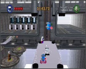 Po dezaktywacji obydwu barier, udaj się do korytarza z prawej i wejdź do pomieszczenia machając do kamery Bounty Hunterem - Chapter 2 - Discovery on Kamino - Challenges - Episode 2 - LEGO Star Wars: The Complete Saga - poradnik do gry