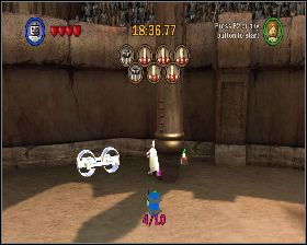 Za filarem, przy którym znajdują się dwa okrągłe klocki - Chapter 4 - Jedi Battle - Challenges - Episode 2 - LEGO Star Wars: The Complete Saga - poradnik do gry