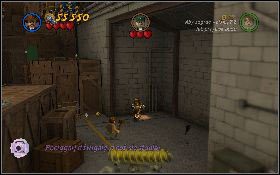 Po animacji wejdź do samochodu i stań nim na jednym z dwóch pomarańczowych punktów [1] z prawej strony hali - Rzeź w Hangarze | Kryształowa Czaszka Akt I | LEGO Indiana Jones 2 - LEGO Indiana Jones 2: The Adventure Continues - poradnik do gry