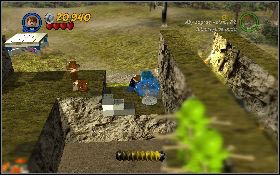 Uruchom panel [1] , znajdujący się pod ogrodzeniem, dzięki czemu będzie mógł do ciebie dołączyć drugi bohater - Cmentarny grobowiec (bonus) | Kryształowa Czaszka Akt II | LEGO Indiana Jones 2 - LEGO Indiana Jones 2: The Adventure Continues - poradnik do gry