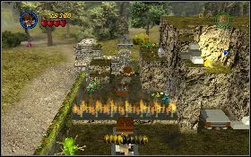 Podnieś ze skrzyni bazookę i udaj się do lewego, dolnego narożnika, gdzie znajdziesz szpadel [1] - Wąwóz w dżungli (bonus) | Kryształowa Czaszka Akt II | LEGO Indiana Jones 2 - LEGO Indiana Jones 2: The Adventure Continues - poradnik do gry