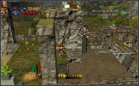 Przekręć nią zawór przy ścianie [1] , a Jonesem użyj bicza na chwytaku z prawej [2] , zeskocz na platformę i przedostań się ląd z prawej - Żarty w dżungli (bonus) | Kryształowa Czaszka Akt III | LEGO Indiana Jones 2 - LEGO Indiana Jones 2: The Adventure Continues - poradnik do gry