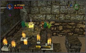 Wskocz Jonesem na platformę z lewej, przeskocz na murowany blok, a ogień palący się na kolejnym [1] zgaś przy pomocy butelki z wodą - Jaskiniowi harcownicy (bonus) | Kryształowa Czaszka Akt III - LEGO Indiana Jones 2: The Adventure Continues - poradnik do gry