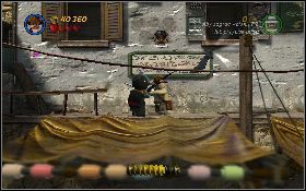 Zwierzę odrzuci ci klucz, z którym udaj się do mechanizmu z prawej [1] - Rzeź na rynku | Poszukiwacze Zaginionej Arki | LEGO Indiana Jones 2 - LEGO Indiana Jones 2: The Adventure Continues - poradnik do gry