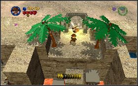 Wróć na środek lokacji, wskocz na ruchomą platformę z lewej, potem przeskocz na drugą z prawej strony [1] , a następnie dostań się do skarbu [2] - Hangar na lotnisku (bonus) | Poszukiwacze Zaginionej Arki | LEGO Indiana Jones 2 - LEGO Indiana Jones 2: The Adventure Continues - poradnik do gry