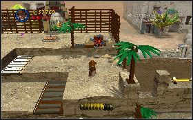Skieruj się w lewo i użyj bicza na chwytaku [1] - Baza łodzi podwodnych (bonus) | Poszukiwacze Zaginionej Arki - LEGO Indiana Jones 2: The Adventure Continues - poradnik do gry