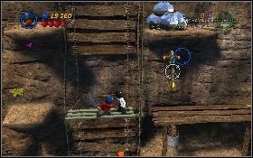 Idź cały czas w lewo, aż dotrzesz do detonatora [1] , na który wskocz - Wspinaczka na klif (bonus) | Świątynia Zagłady | LEGO Indiana Jones 2 - LEGO Indiana Jones 2: The Adventure Continues - poradnik do gry
