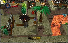 Potem, uważając na piłę, wbiegnij na górę [1] i obejdź kamienny murek - Jaskinia niewolnika (bonus) | Świątynia Zagłady | LEGO Indiana Jones 2 - LEGO Indiana Jones 2: The Adventure Continues - poradnik do gry